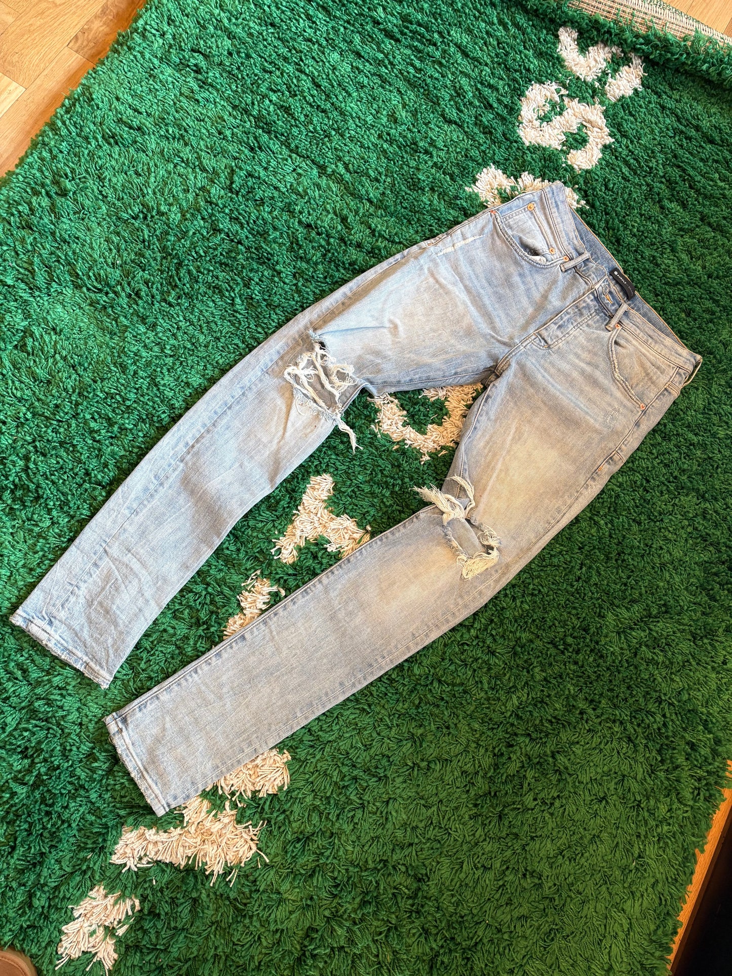 Purple Jeans Light Wash Knee Distressed Size 32