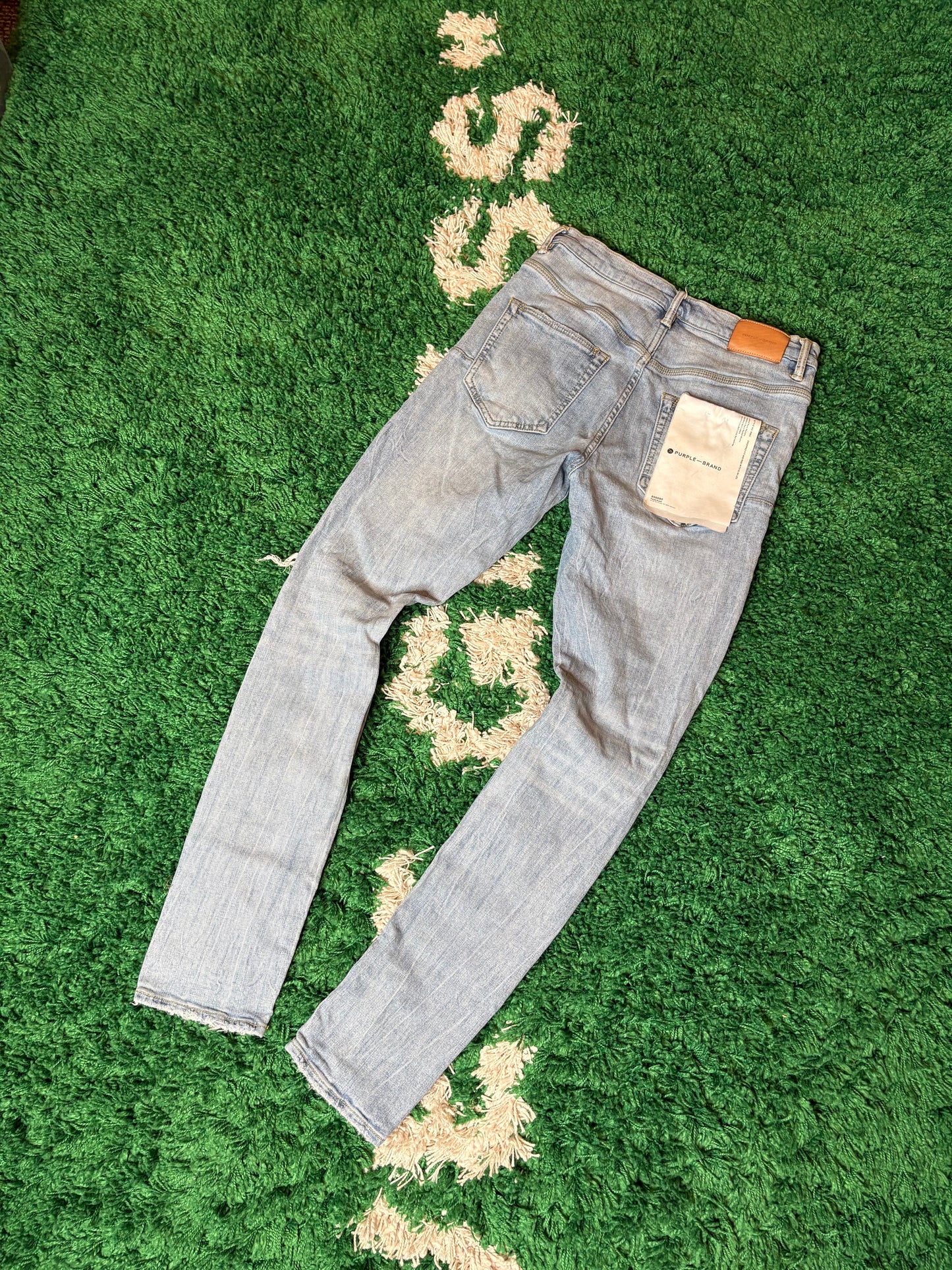 Purple Jeans Light Wash Distressed Size 31