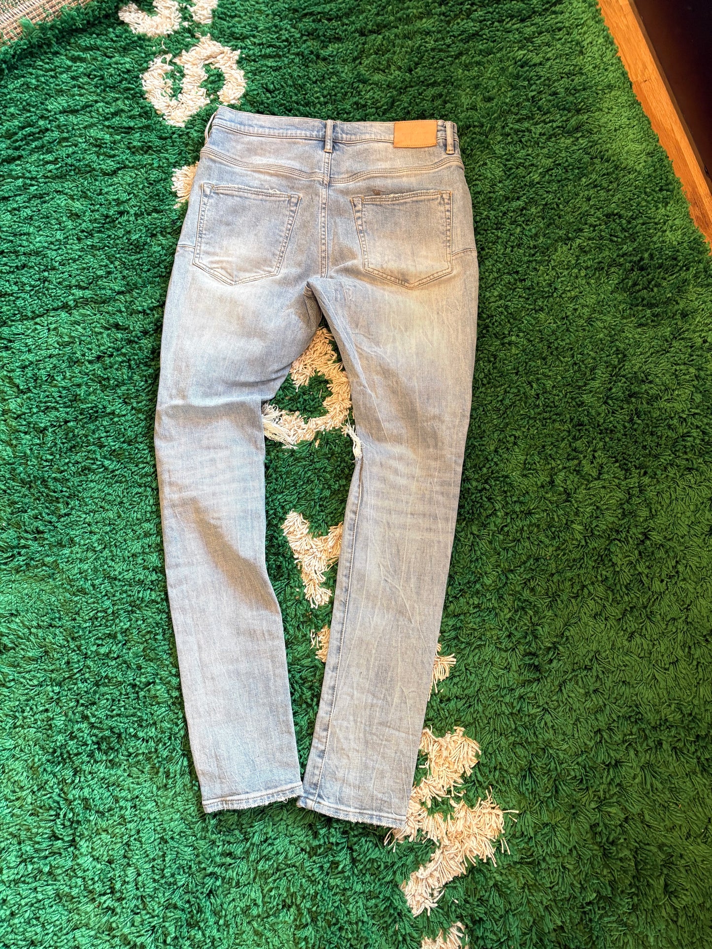 Purple Jeans Light Wash Knee Distressed Size 32