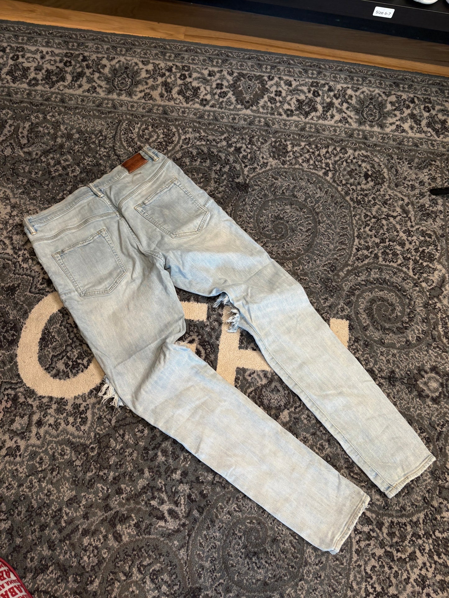 Purple Jeans Light Wash Distressed Size 33
